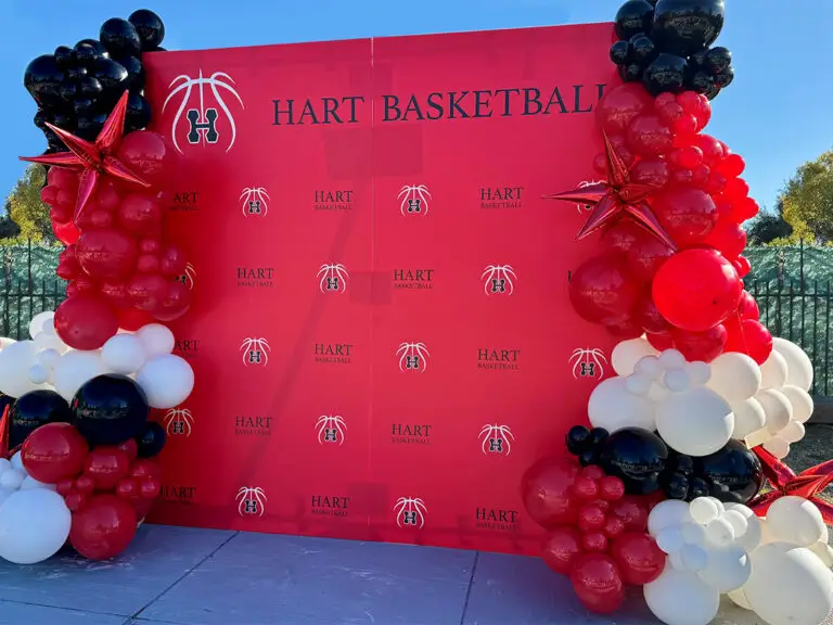 Team banners, sponsor signage, and sports graphics